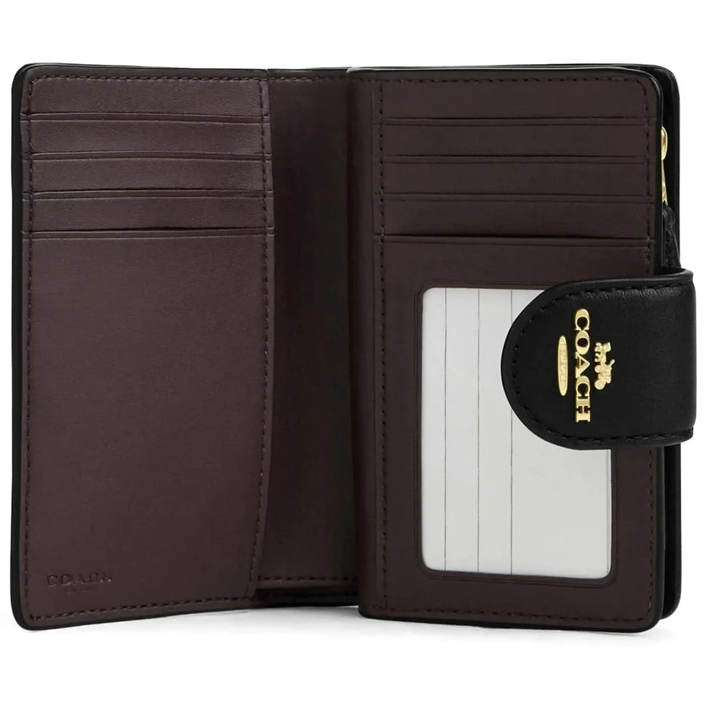 COACH Women’s Signature Embossed Leather Bifold Wallet CZ341