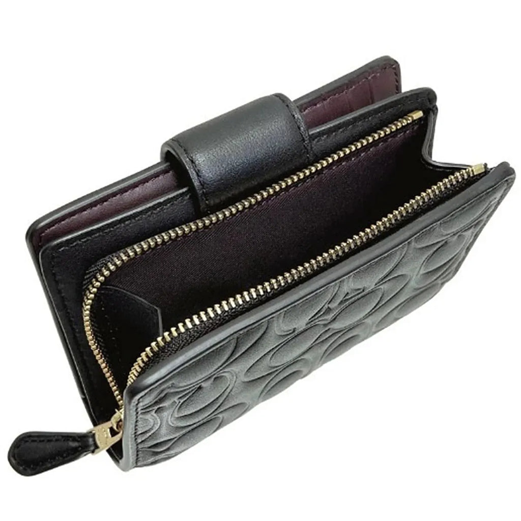 COACH Women’s Signature Embossed Leather Bifold Wallet CZ341