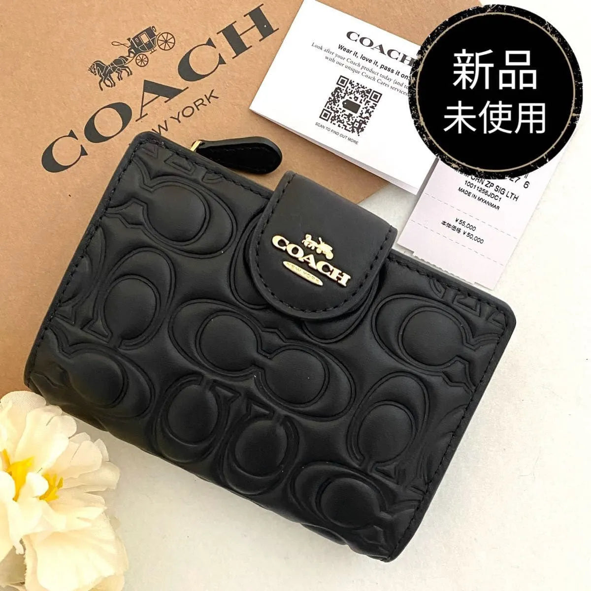 COACH Women’s Signature Embossed Leather Bifold Wallet CZ341