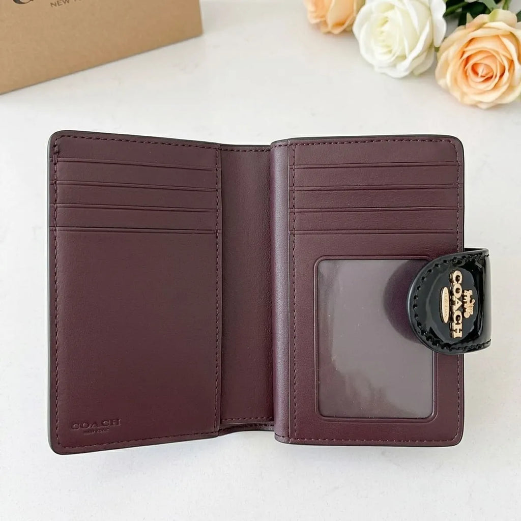 COACH Women’s Signature Patent Leather Medium Corner Zip Wallet CV414