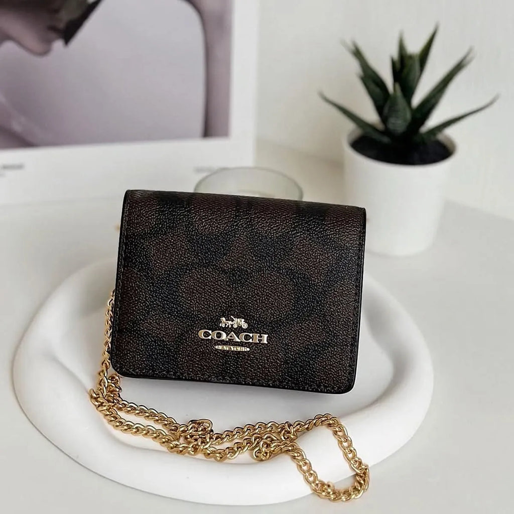 COACH Women’s Signature Canvas Mini Wallet on a Chain CZ278