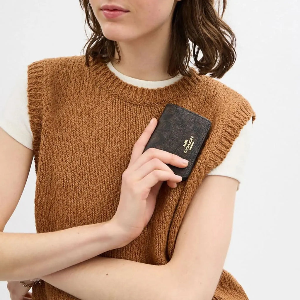 COACH Women’s Signature Canvas Mini Wallet on a Chain CZ278